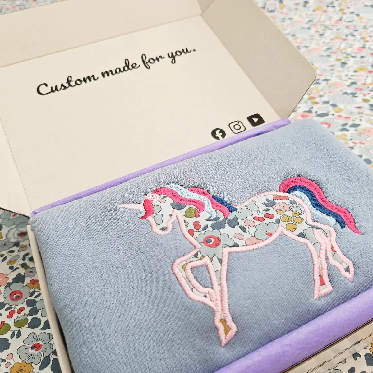 Personalised unicorn sweatshirt presented in a beautiful birthday gift box, made in Melbourne and ready to ship Australia‑wide